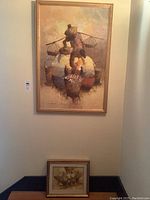 View of both paintings together on a wall with smaller painting placed beneath the larger one.