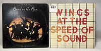 Front view of the two vinyl record albums, Band on the Run and Wings at the Speed of Sound, showing their cover art