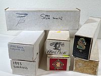 Seven white cardboard boxes stacked, showing handwritten labels for MLB card sets including 1992 Score Series 1+2, 1993 Donruss, 1994 Fleer Complete Set, Proline, and one unlabeled box.