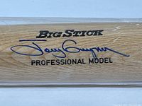 Close-up of Tony Gwynn's blue ink autograph on the bat along with Big Stick and Professional Model text.