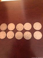 Photo showing the reverse sides of 10 Canadian nickels from 1920s and 1930s, displaying the beaver design and denomination details.