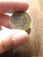 Reverse side showing 'ONE CENT 1899' surrounded by wreath