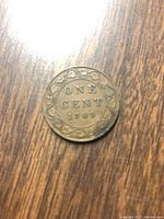 Reverse side of the 1909 Canadian large cent showing the denomination and year with wreath design.