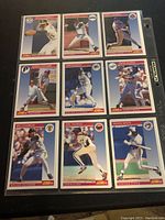 First photo showing nine baseball cards in plastic sheet. Players include Kevin Seitzer, Andy Van Slyke, and others from teams like Brewers, Phillies, Cubs.