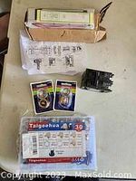 Top view showing electric door lock, cartridge fuse box, packaged automotive fuses and Taigoahua fuse box