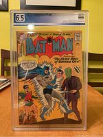 Front view of graded Batman #160 comic book in protective casing showing cover art and grade label