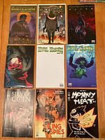 9 comics laid out on floor showing covers - House Of Slaughter, Nocterra, Alien, 2 Evil Ernie, The Silver Coin, King Of Spies, 2 Chaos Anthology issues