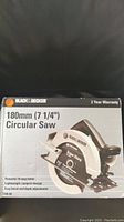 Front image of the Black & Decker circular saw box highlighting the saw and its main features such as blade size and motor specs.