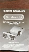 Front of the operations manual showing 'Nintendo Classic Mini Entertainment System' with image of console and controller.