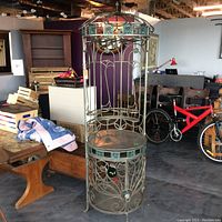 Full view of wrought iron wine bar in showroom