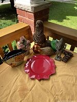 Wide shot of all items from above on yellow tablecloth with wooden porch railing background.
