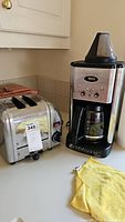Full view of the Cuisinart coffee machine and Dualit toaster on countertop.