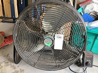 Front view of the Honeywell commercial fan showing the grille and brand label.