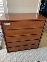 Front view of the dresser showing five full-width drawers