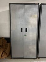 Front view of closed cabinet showing diamond-pattern doors