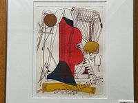 Full view of framed lithograph showing composition of cello, piano keys, harp and stool.