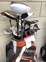 OGIO stand golf bag filled with clubs