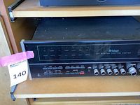 Front view of McIntosh C37 preamp on shelf showing overall condition and panel layout