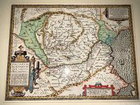 Full view of map matted and framed under glass showing decorative border