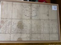 Overall view of framed map on wall