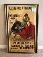 Full view of framed poster against wall