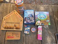 Full lot overview showing all games including Horse Race game, Jenga, Gravestone, Endange, DOS, Brain Quest, and Insect Domino.