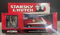 Original boxed set with Ford Gran Torino car and Starsky & Hutch figures displayed in box.