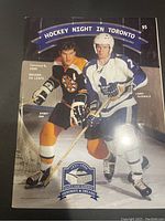 Front cover of 1999 Toronto Maple Leafs hockey program featuring Bobby Orr and Lanny McDonald, dated January 9, 1999, commemorating last year at Maple Leaf Gardens.