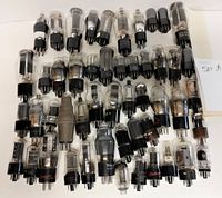 Top-down image showing all 50 vacuum tubes spread out with various sizes and base types visible