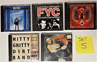 Front covers of the 5 CD albums showing the bands Journey, Fine Young Cannibals, AC/DC, Ted Nugent, and Nitty Gritty Dirt Band.