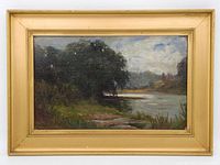 Framed landscape painting showing river bank and trees