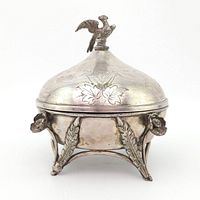 Front view of bowl on four foliate legs