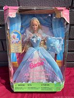 Full view of the original box containing the 1998 Sleeping Beauty Barbie doll, showing box wear and packaging details.