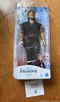 Photo of new, unopened Disney Frozen II Kristoff doll in plastic window box with Frozen II branding.