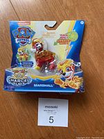Photo of new unopened Paw Patrol Mighty Pups Marshall action figure in packaging