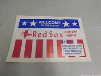 Front side of the folded poster with Red Sox Poster Night text and featuring players' names and Red Sox logo.