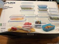 Photo of unopened Snaplock 36-piece food storage container set box showing containers in various sizes and included dividers