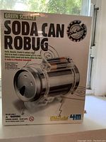 Front view of the 4M Green Science Soda Can Robug box showing the silver robot design and branding.