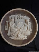 Front view of Incolay stone plate with relief of Antony and Cleopatra, 10 inches diameter