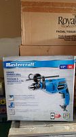 Front of the box showing Mastercraft branding, hammer drill image and key features