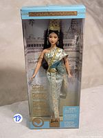 Full boxed doll showing packaging and doll in traditional Cambodian costume.