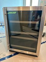 front view stainless steel wine fridge with glass door