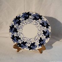 Front view of the 10 inch Coalport Blue Maple plate showing blue maple leaf pattern and gold rim trim.