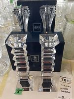 Pair of Mikasa stepped geometric design crystal candle holders in front of Mikasa box with signage and price tag visible.