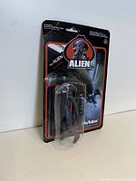 Front view of the Alien movie figure in original unopened blister packaging showing detailed figure and artwork on the card.