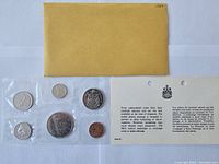 1969 Canadian coin set original yellow envelope with 6 coins visible in plastic holder plus informational insert