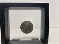 Front view of the 1946 Canadian nickel coin showing King George VI profile.