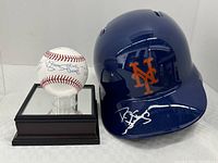 Darryl Strawberry signed baseball on acrylic display stand and signed New York Mets batting helmet