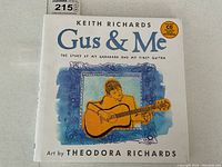 Front cover of Gus & Me hardcover book by Keith Richards, art by Theodora Richards, includes CD sticker