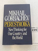 Front cover of dust jacket showing title 'Mikhail Gorbachev Perestroika New Thinking for Our Country and the World' on a dark navy background.